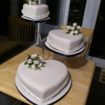3 Tier Heart Shape Wedding Cake With White Tulip Sugar Srpays