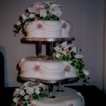 3 Tier Petal Wedding Cake with Sugar Lillies And Roses