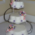 3 Tier Petal Wedding Cake With Calla Lilies Roses And Freesia