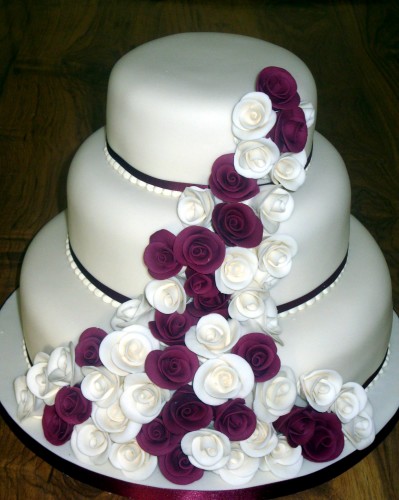 3 Tier Stacked Wedding Cake With Claret And Ivory Roses