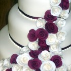 3 Tier Stacked Wedding Cake With Claret And Ivory Roses