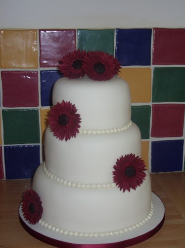 3 Tier Stacked Wedding Cake With Gerberas