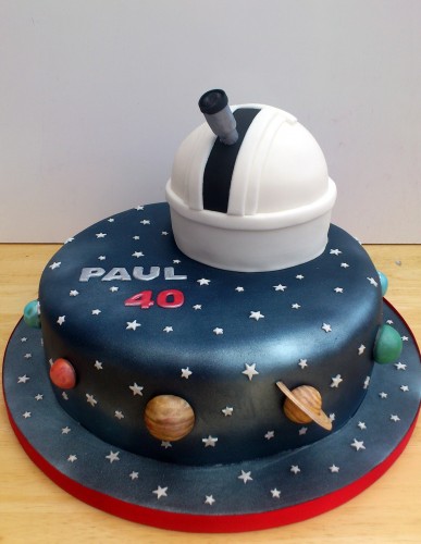 astronomy themed novelty cake with observatory