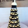 wedding cupcake tower with giant cupcake bride and groom topper  thumbnail