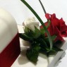 2 tier square stacked wedding cake with deep red rose sugar flower spray  thumbnail