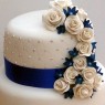 3 tier round stacked wedding cake sapphire blue and white sugar flowers thumbnail