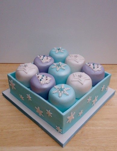 box of mini sparkling novelty christmas cakes