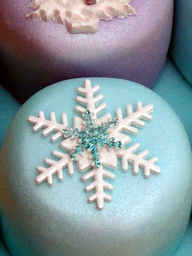 box of mini sparkling novelty christmas cakes