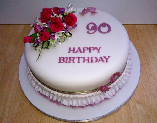 90th birthday cake with a sugar rose spray