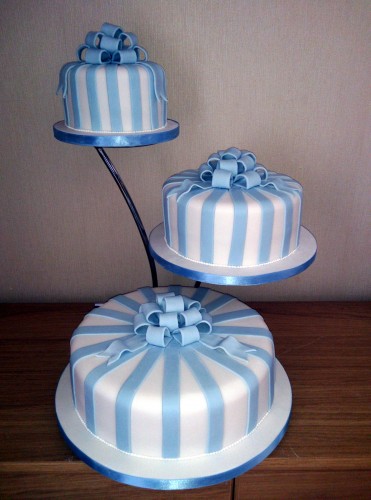 3 tier blue and white striped wedding cake
