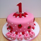 strawberry themed 1st birthday cake