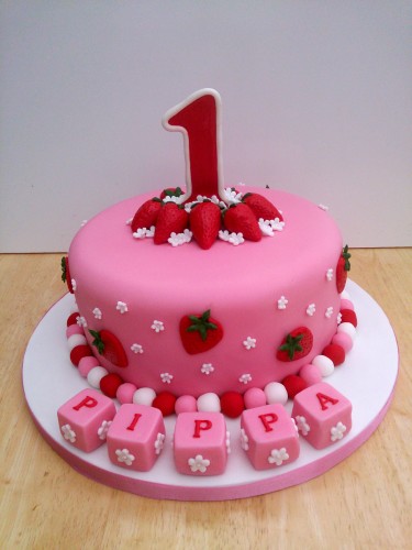 strawberry themed 1st birthday cake