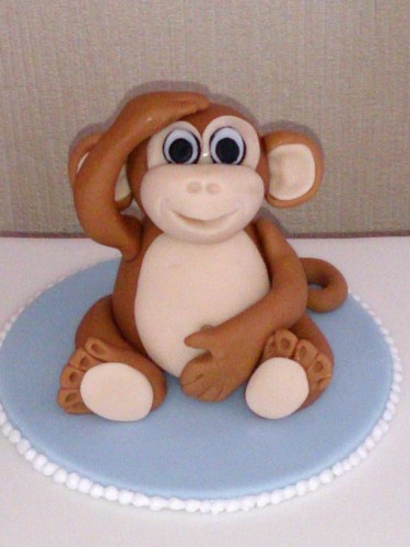 Cheeky monkey christening cake