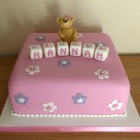 Floral Christening Cake With Bear