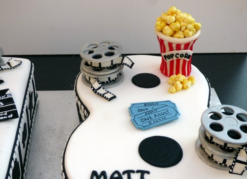 Fi;m cinema themed 18th birthday cake