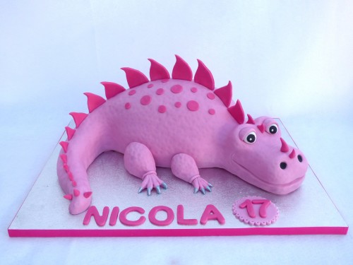 pink dinosaur birthday cake