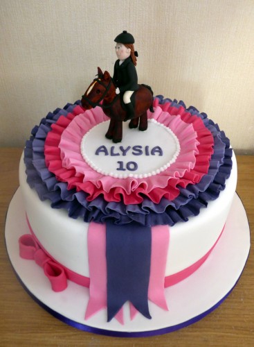 show jumping pony with rosette themed birthday cake