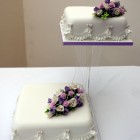 2 tier classic floral wedding cake with sugar flower spray