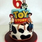 2 tier toy story cake with woody jessie and buzz lightyear