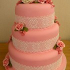 3 tier wedding cake with lace peonies and roses