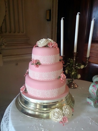 3 tier wedding cake with lace peonies and roses
