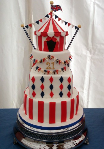 4 tier circus themed cake with big top sponge pole dorset