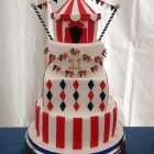 4 tier circus themed cake with big top