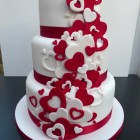 red and white heart themed 3 tier wedding cake