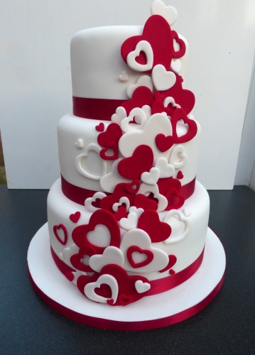 red and white heart themed 3 tier wedding cake