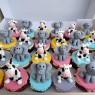 twins 11th birthday cake with cow and elephants and cupcakes thumbnail