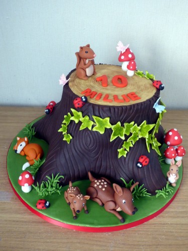 woodland themed birthday cake tree stump squirrel fox rabbit deer toadstool