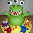 3 eyed green monster and friends fun birthday cake