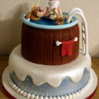 Santa and rudolph in a hot tub novelty christmas cake