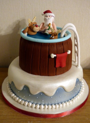 Santa and rudolph in a hot tub novelty christmas cake