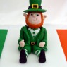 st patrick's day celebration cake with leprechaun topper thumbnail