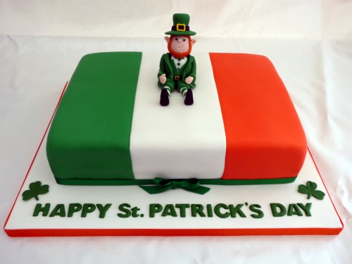 st patrick's day celebration cake with leprechaun topper