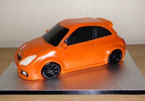 electric-orange-vauxhall-corsa-car-birthday-cake