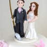 3-tier-groom-fishing-themed-and-roses-wedding-cake thumbnail