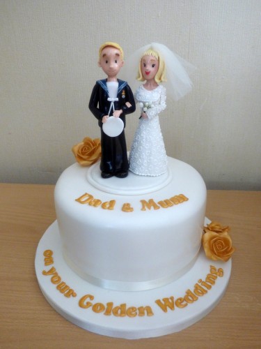 golden-wedding-anniversary-cake-bride-and-groom-topper