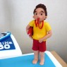 trio-of-celebration-cakes-latin-dancer-paddle-boarder-life-guard thumbnail