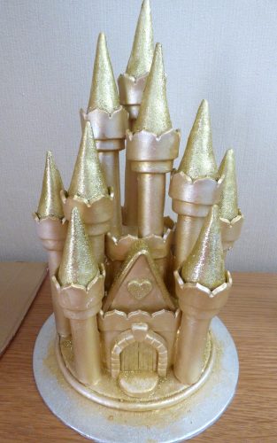 gold-castle-wedding-cake-topper