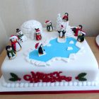 penguins-having-fun-christmas-cake