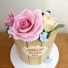 tub-of-sugar-flowers-birthday-cake