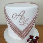 simple-tall-single-tier-weddong-cake-monogram