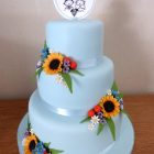 3-tier-pale-blue-sunflower-themed-wedding-cake