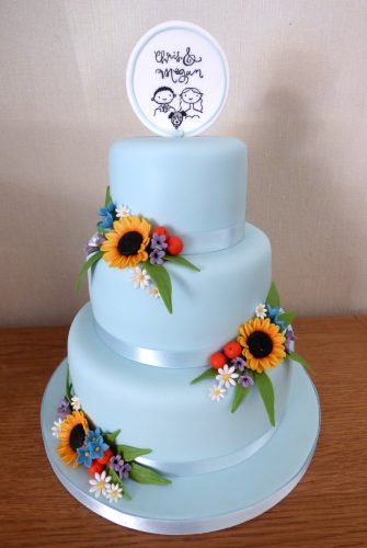 3-tier-pale-blue-sunflower-themed-wedding-cake