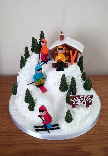 apres-ski-chalet-bar-snowy-mountain-birthday-cake