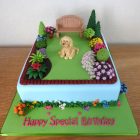 garden-themed-birthday-cake-with-pet-dog
