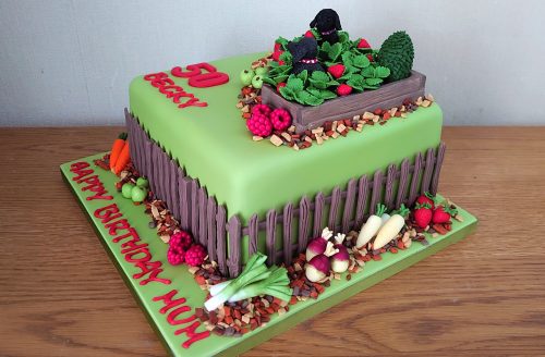 raised-strawberry-bed-with-dogs-and-produce-garden-birthday-cake