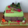 raised-strawberry-bed-with-dogs-and-produce-garden-birthday-cake thumbnail